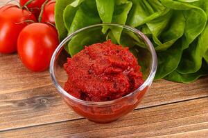 Tomato puree sauce for cooking photo