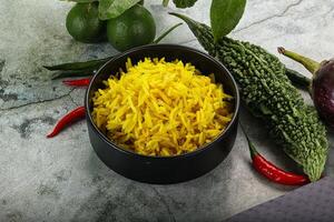 Indian cuisine - Lemon rice with spices photo