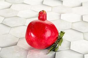 Ripe red sweet and juicy Pomegranate photo