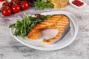 Tasty delicous grilled salmon steak photo