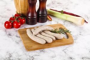 Natural organic raw pork sausages photo