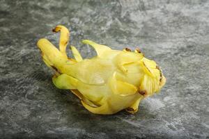 Tropical exotic yellow dragon fruit photo