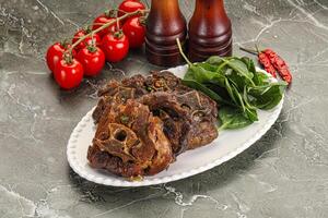 Grilled Lamb neck with spices photo