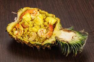 Thai cuisine - rice with prawn in pineapple photo