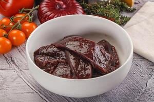 Raw beef liver slices for cooking photo