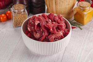 Raw beef meat - sliced strips photo