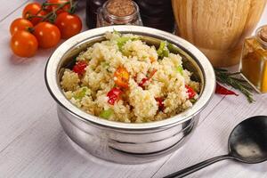 Vegan cuisine couscous with vegetables photo