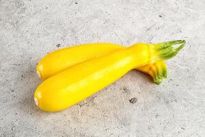 Yellow young zucchini for cooking photo