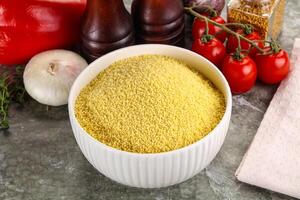 Raw dry wheat couscous grain photo