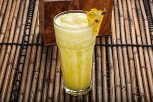 Sweet cold pineapple juice refreshment photo