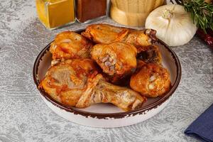 Raw marinated chicken drumstick for cooking photo