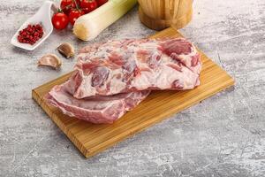 Raw pork ribs for barbecue photo
