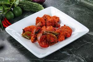 Indian cuisine - chicken tikka barbecue photo