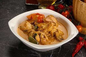 Thai Tom yum soup with chicken photo