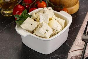 Greek traditional Feta cheese cubes photo