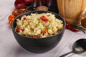 Vegan cuisine couscous with vegetables photo