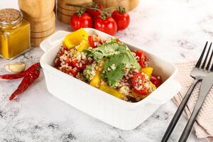 Dietary vegetarian quinoa with vegetables photo