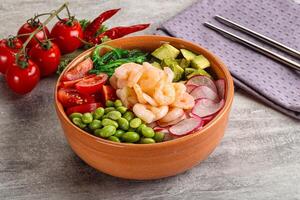 Hawaian cuisine - Poke with cocktail shrimps photo