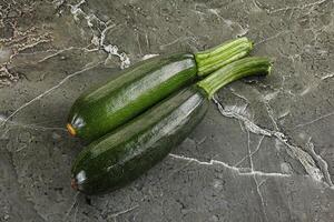 Sliced raw young green zucchini photo