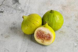 Ripe sweet juicy green fig heap photo