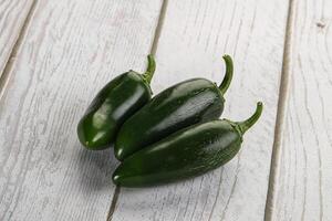 Raw green Mexican jalapeno pepper photo