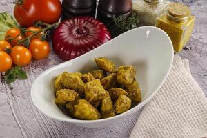 Indian cuisine curry chicken fillet photo