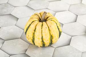 Ripe raw fresh decorative pumpkin photo