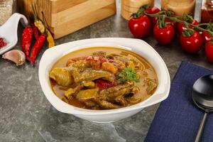 Yellow THai curry with beef photo