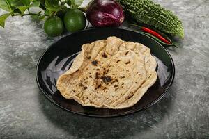 Indian traditional tandori bread - Roti photo