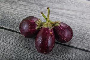 Raw smal asian baby eggplant photo