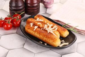 Fried cheese sticks for snack photo