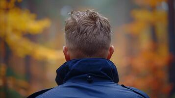 AI generated Contemplative man enjoying peaceful autumn scenery in the park photo