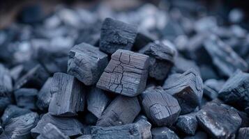 AI generated Close-up of black charcoal pieces for grilling and industrial use photo