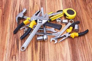 tools on wooden background photo