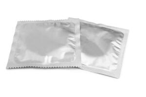 Condom on white photo