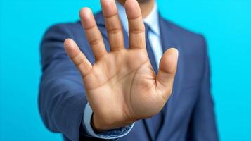 AI generated Businessman gesturing stop with open hand in blue suit photo