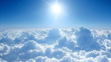 AI generated Breathtaking view of sun above clouds in a clear blue sky photo