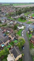 alto ángulo ver de arseley pueblo de Inglaterra Reino Unido. el vertical y retrato estilo imágenes estaba capturado durante nublado y lluvioso día de feb 28, 2024 video