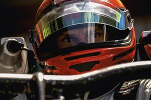 AI generated Close-up of a serious male bolide racer in a protective helmet looking at camera, racing sport photo