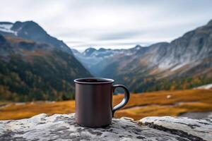 AI generated Iron camping mug with empty place for branding standing against the backdrop of the mountains, a gray simple metal cup in nature photo