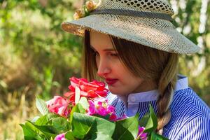 pretty young woman in the nature, summer scenery photo