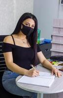 pretty young woman working in office, office girl at the work photo