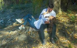 romantic couple in the garden, couple in the nature photo