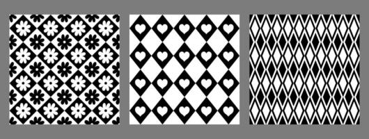Set of black and white diamond seamless patterns. Vector graphics.