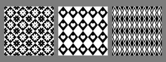 Set of black and white diamond seamless patterns. Vector graphics.