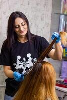 pretty young woman in beauty salon photo