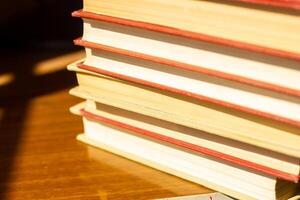 stack of books on the table, pile of books, books background photo