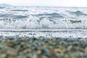 water drops on the beach, close up of a sand on the beach photo