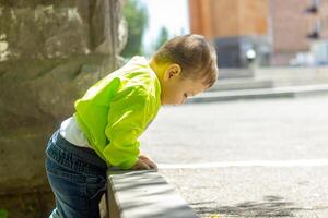 child playing in the garden, child playing on the playground photo