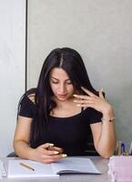 pretty young woman working in office, office girl at the work photo